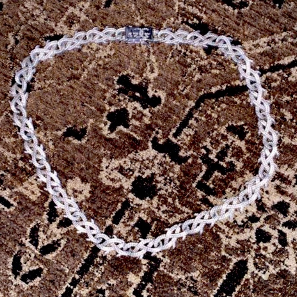 Gold barbwire chain covered in silver